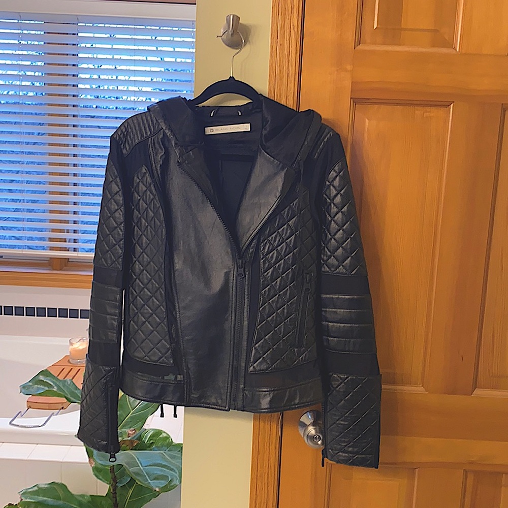 Blanc noir black moto leather jacket with embellishments.